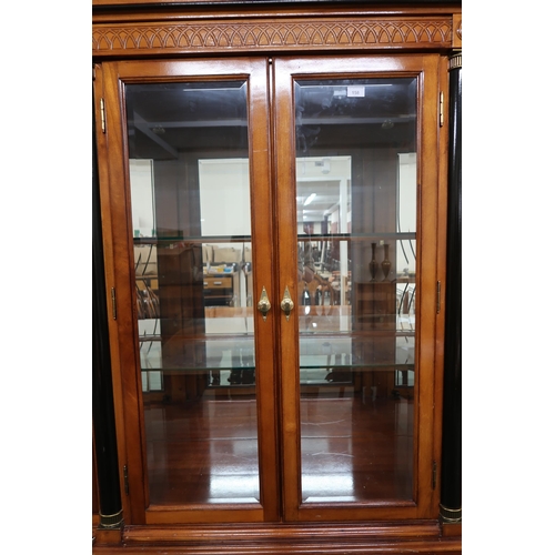 158 - A 20th century reproduction mahogany and maple inlaid breakfront display cabinet with cornice over f... 