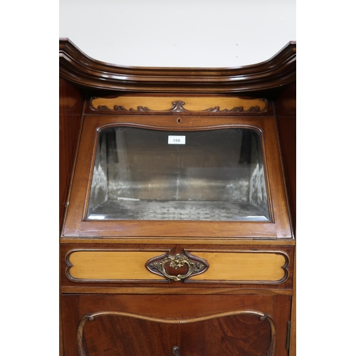 159 - A 20th century mahogany art nouveau style display cabinet with shaped top over central glazed fall f... 