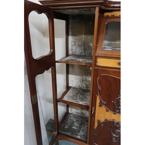 159 - A 20th century mahogany art nouveau style display cabinet with shaped top over central glazed fall f... 