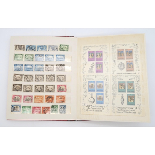 497 - STAMPS a collection of stamps in albums with mixed British, colonies to include Malta, Jamaica, Nata... 