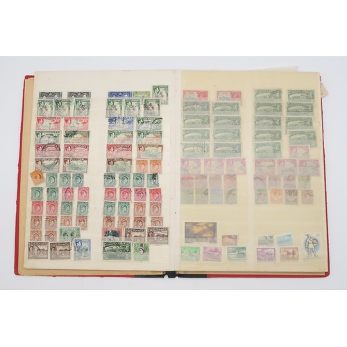 497 - STAMPS a collection of stamps in albums with mixed British, colonies to include Malta, Jamaica, Nata... 