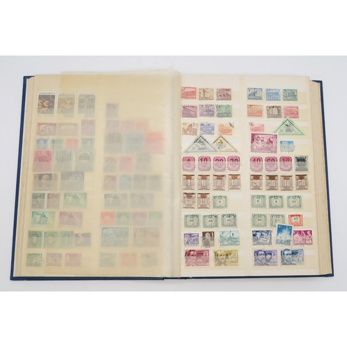 497 - STAMPS a collection of stamps in albums with mixed British, colonies to include Malta, Jamaica, Nata... 