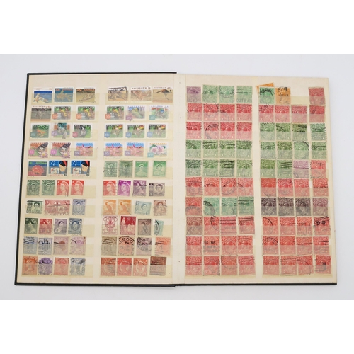 497 - STAMPS a collection of stamps in albums with mixed British, colonies to include Malta, Jamaica, Nata... 