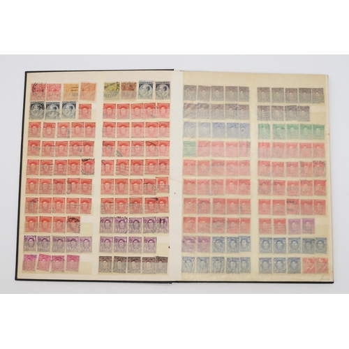 497 - STAMPS a collection of stamps in albums with mixed British, colonies to include Malta, Jamaica, Nata... 