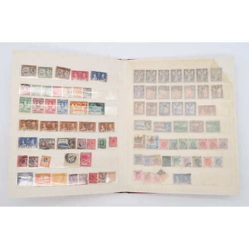 497 - STAMPS a collection of stamps in albums with mixed British, colonies to include Malta, Jamaica, Nata... 