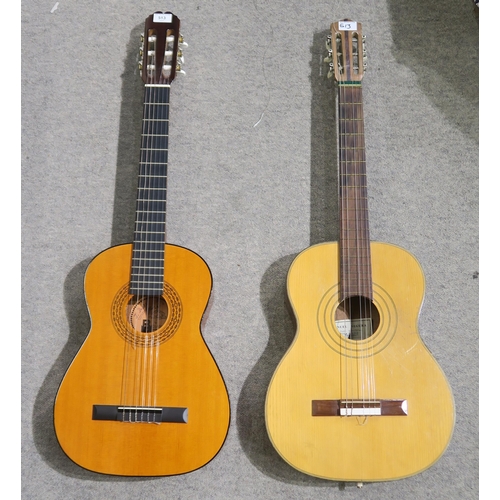 513 - A Manuel Segura nylon strung acoustic guitar together with another Spanish guitar