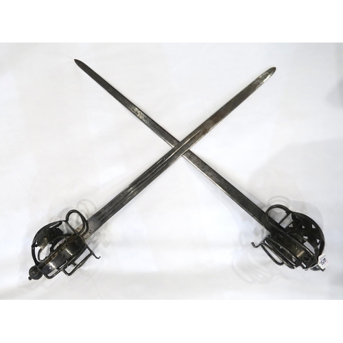 528 - Two Scottish basket-hilted broadswords, of recent manufacture, one with blade measuring approx. 72.5... 