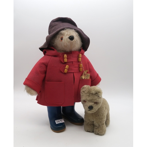 543 - A Paddington teddy bear by Gabrielle Designs, wearing red felt coat and Dunlop Wellington boots, ret... 