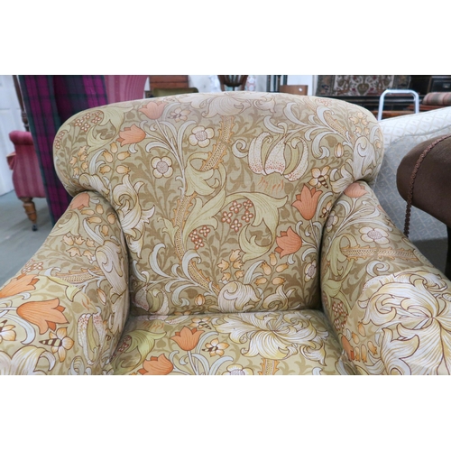 62 - A late Victorian humpback armchair, 83cm high x 83cm wide x 85cm deep and poof both with floral dama... 