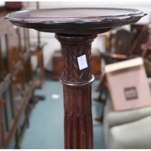 63 - A 20th century mahogany torchiere stand with circular top on reeded column on stepped base, 153cm hi... 