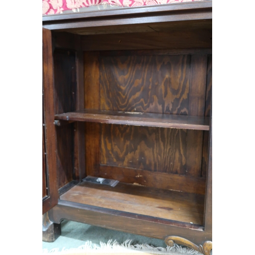 64 - A 20th century mahogany reproduction cabinet with pair of doors with metallic wire lattice panel fro... 