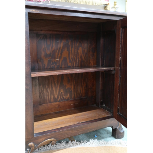 64 - A 20th century mahogany reproduction cabinet with pair of doors with metallic wire lattice panel fro... 