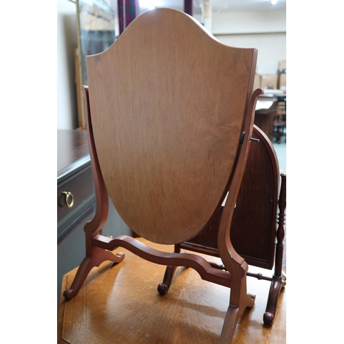 78 - A 20th century octagonal two door cabinet and two assorted dressing mirrors (3)