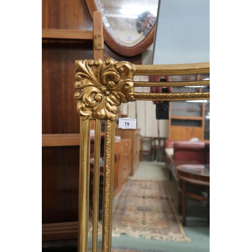 79 - A large 20th century gilt framed over mantel mirror, 114cm high x 185cm wide and a modern standard l... 