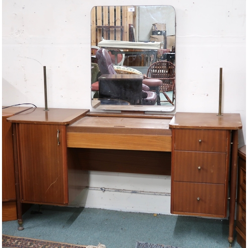 80 - A mid 20th century teak mirror backed dressing table with central mirror over tambour drawer flanked... 