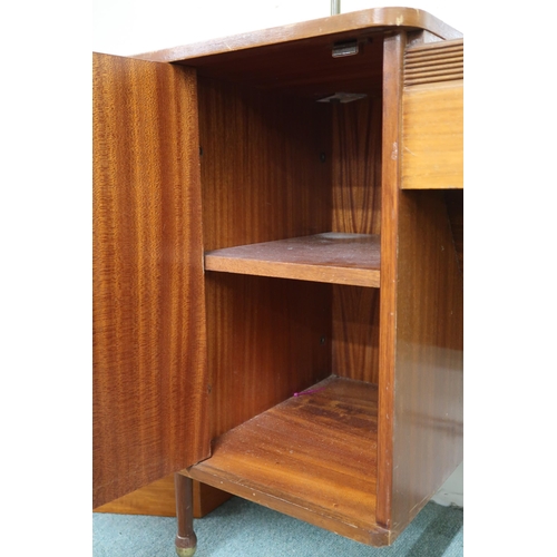 80 - A mid 20th century teak mirror backed dressing table with central mirror over tambour drawer flanked... 