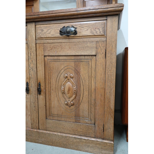 84 - *WITHDRAWN* A Victorian oak mirror backed sideboard with carved and moulded cornice over mirror back... 