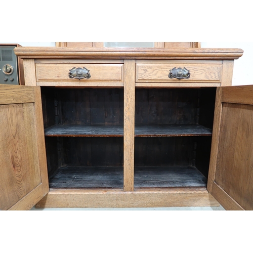 84 - *WITHDRAWN* A Victorian oak mirror backed sideboard with carved and moulded cornice over mirror back... 