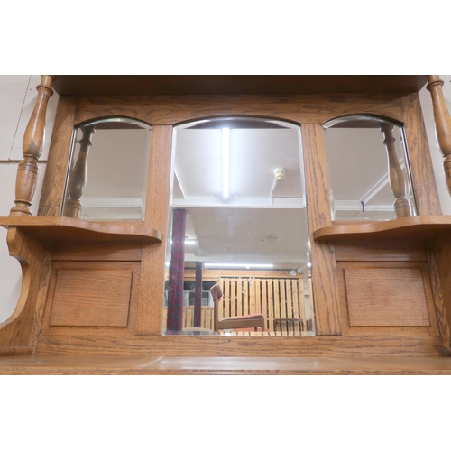 84 - *WITHDRAWN* A Victorian oak mirror backed sideboard with carved and moulded cornice over mirror back... 