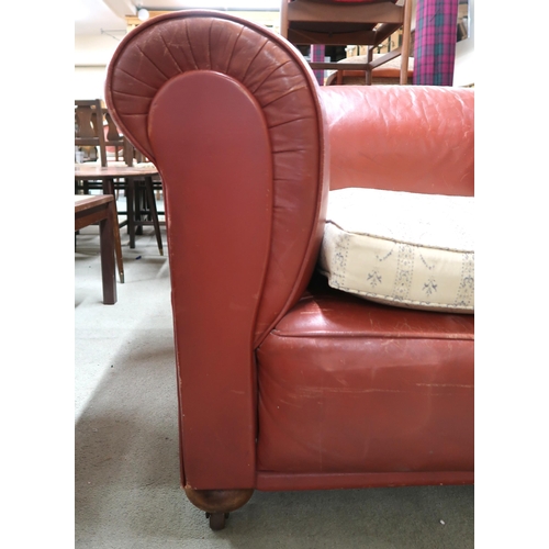 92 - A 20th century leather upholstered club style drop end settee with upholstered cushions, 73cm high x... 