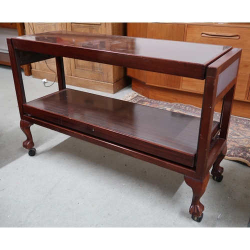 94 - A mid 20th century teak metamorphic buffet table on ball and claw feet, 74cm high x 116cm wide x 38c... 