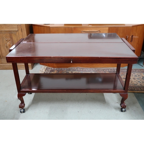 94 - A mid 20th century teak metamorphic buffet table on ball and claw feet, 74cm high x 116cm wide x 38c... 