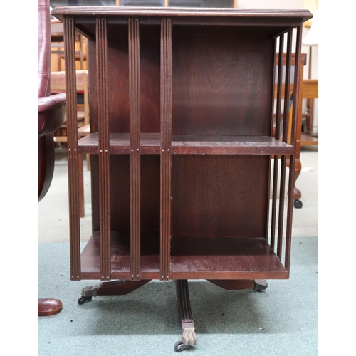 98 - *PLEASE NOTE THE CHAIR IS NOT PART OF THIS LOT*A 20th century mahogany revolving bookcase with two t... 