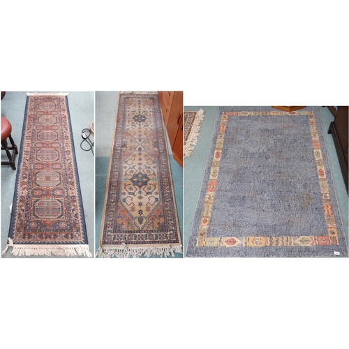 99 - A lot comprising three assorted machine made rugs (3)