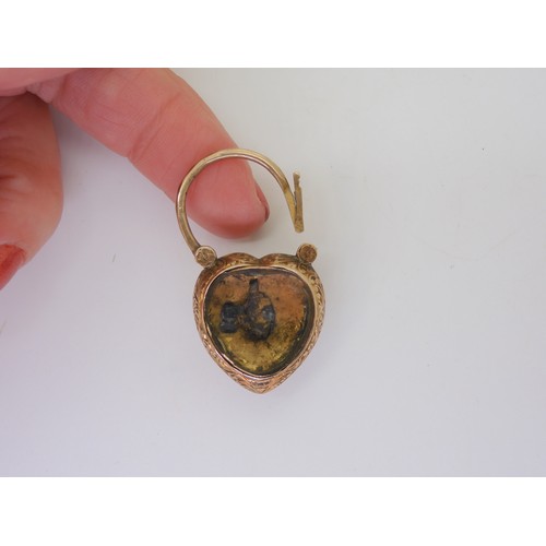 653 - A large heart shaped locket back clasp, set with moonstone and garnet, a 9ct citrine set brooch and ... 