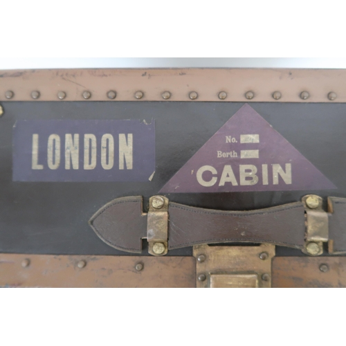 2019 - AN EARLY-20TH CENTURY KONG HING & CO METAL BOUND STEAMER TRUNK exterior labelled for travel aboa... 