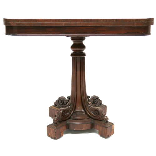 2020 - A GEORGIAN ROSEWOOD FOLDOVER TEA TABLE with rounded corner fold-over top on quatreform pedestal colu... 