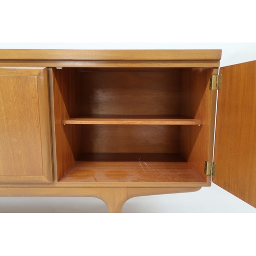 2120 - A MID 20TH CENTURY TEAK GREAVES & THOMAS SIDEBOARD with three drawers and fall front compar... 