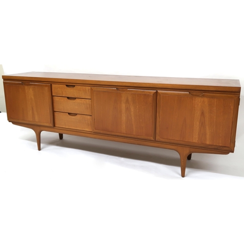 2120 - A MID 20TH CENTURY TEAK GREAVES & THOMAS SIDEBOARD with three drawers and fall front compar... 