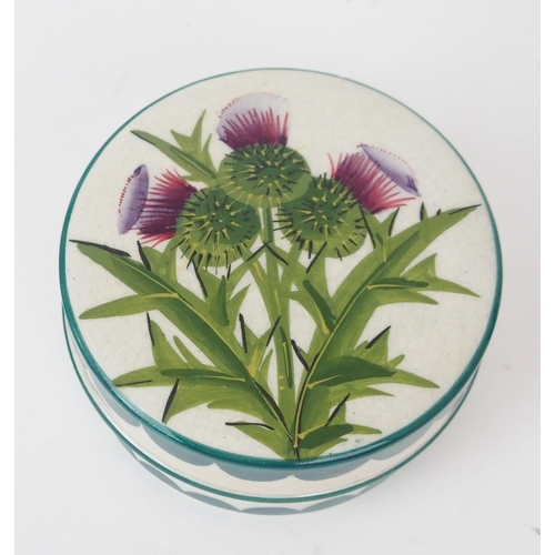 2184 - A WEMYSS THISTLE PATTERN POT AND COVER of cylindrical form, 10cm diameter, a small plate in thistle ... 