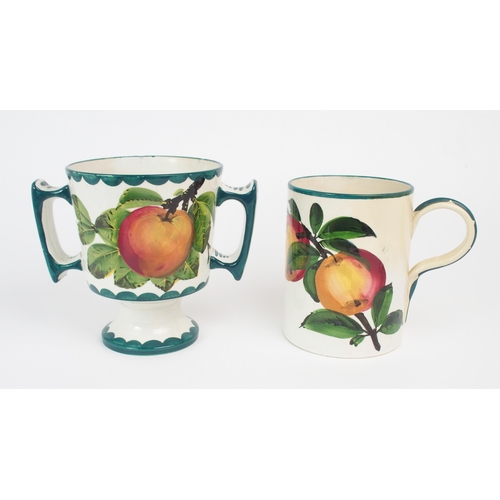 2186 - A COLLECTION OF WEMYSS APPLE PAINTED WARES including a two handled beaker, a tankard, a pair of Kint... 