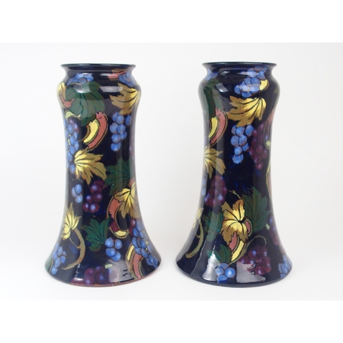 2191 - A PAIR OF ROYAL STANLEY WARE VASES in Jacobean pattern, 31cm high