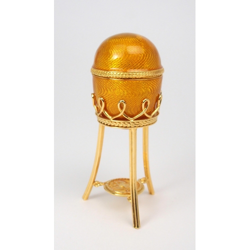 2196 - A FABERGE MENAGERIE COLLECTION SURPRISE EGG the yellow guilloche enamelled egg with hand-carved hard... 