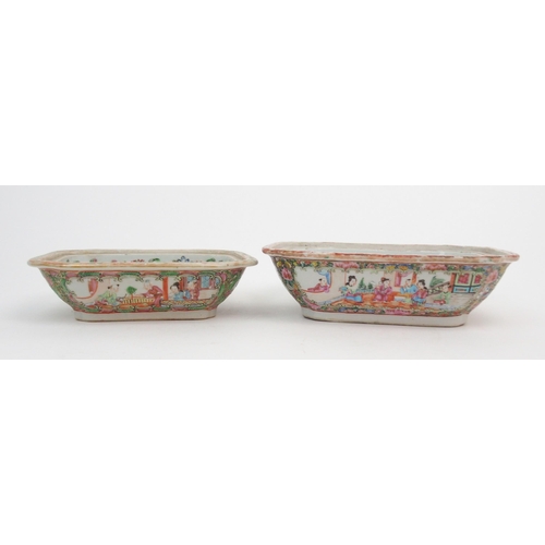 2351 - A CANTONESE FAMILLE ROSE SOUP TUREEN cover, oval ashet and two vegetable bases, painted with figures... 