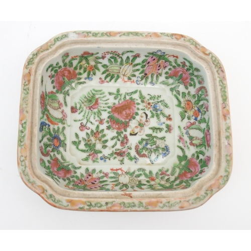 2351 - A CANTONESE FAMILLE ROSE SOUP TUREEN cover, oval ashet and two vegetable bases, painted with figures... 