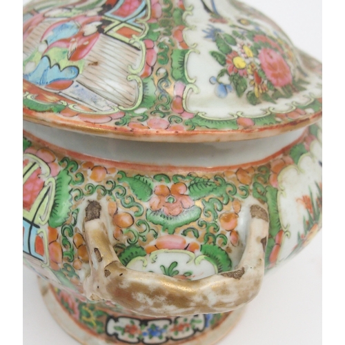 2351 - A CANTONESE FAMILLE ROSE SOUP TUREEN cover, oval ashet and two vegetable bases, painted with figures... 