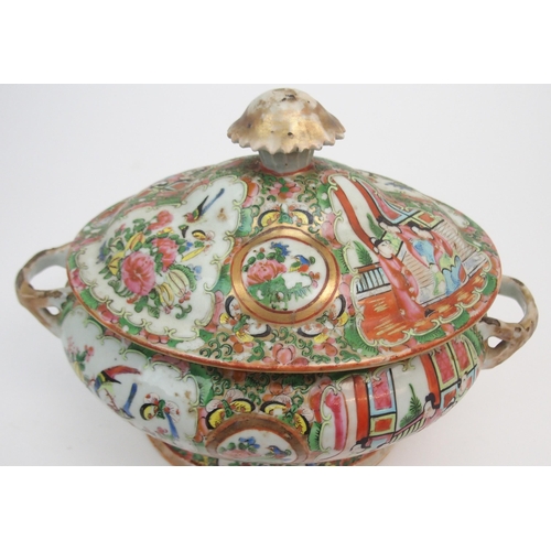 2351 - A CANTONESE FAMILLE ROSE SOUP TUREEN cover, oval ashet and two vegetable bases, painted with figures... 