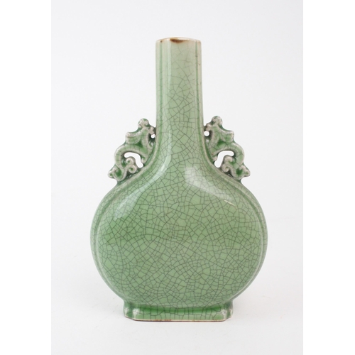 2377 - A CHINESE CRACKLEWARE BALUSTER VASE Applied with pierced scroll handles, 21.5cm high... 