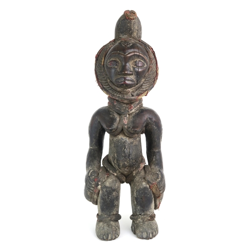 2396 - A CARVED HARDWOOD FEMALE FIGURE, CONGOAugmented with fabric-covered grass banding, measuring approx.... 