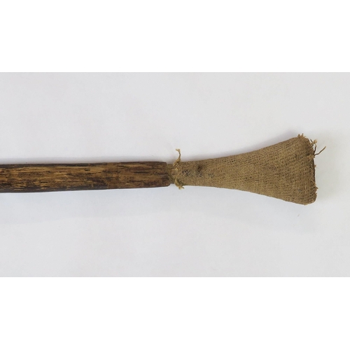 2397 - A PALMWOOD PADDLE, NEW IRELANDThe flared pommel with woven fibre covering, measuring approx. 99.5cm ... 