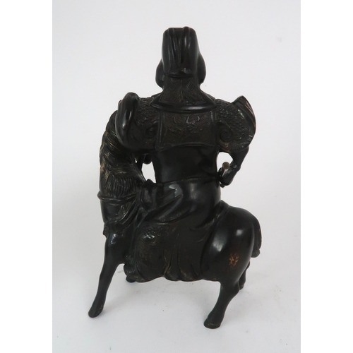 2402 - A BRONZE WARRIOR ON HORSEBACK27cm high and an Archaic style grotesque animal censer, 17.5cm high (2)... 