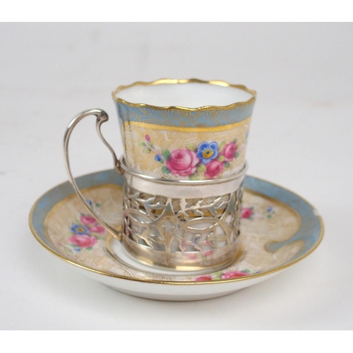 2462 - A CASED GEORGE V SILVER MOUNTED PARAGON COFFEE SERVICEthe coffee cans and saucers floral and gilt de... 