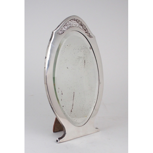 2464 - A GEORGE V SILVER DRESSING TABLE MIRRORby Mappin & Webb, Birmingham 1916, of shaped oval form, t... 