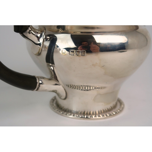 2469 - AN EDWARDIAN BACHELORS SILVER TEA SERVICEmaker's mark rubbed, London 1911, of baluster form, with a ... 