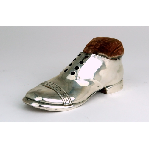 2470 - A GEORGE V NOVELTY SILVER PIN CUSHIONby S. Blanckensee & Son Ltd, modelled in the form of a shoe... 