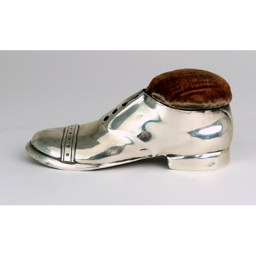 2470 - A GEORGE V NOVELTY SILVER PIN CUSHIONby S. Blanckensee & Son Ltd, modelled in the form of a shoe... 